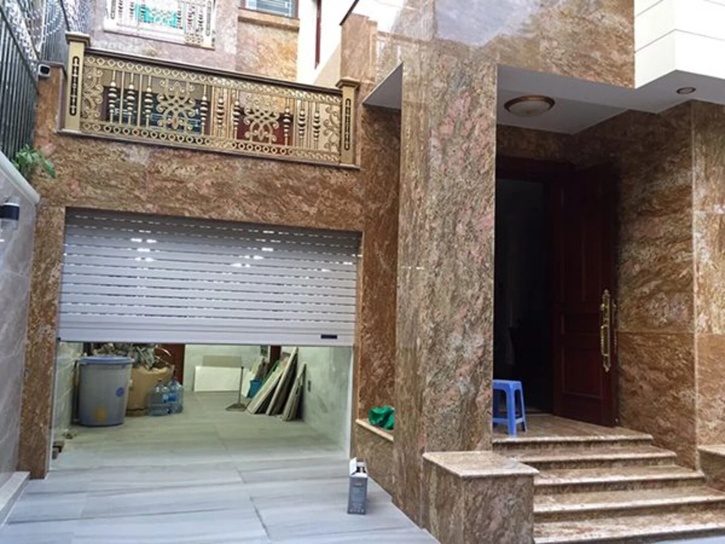 Mẫu gạch giả đá hoa cương ốp mặt tiền