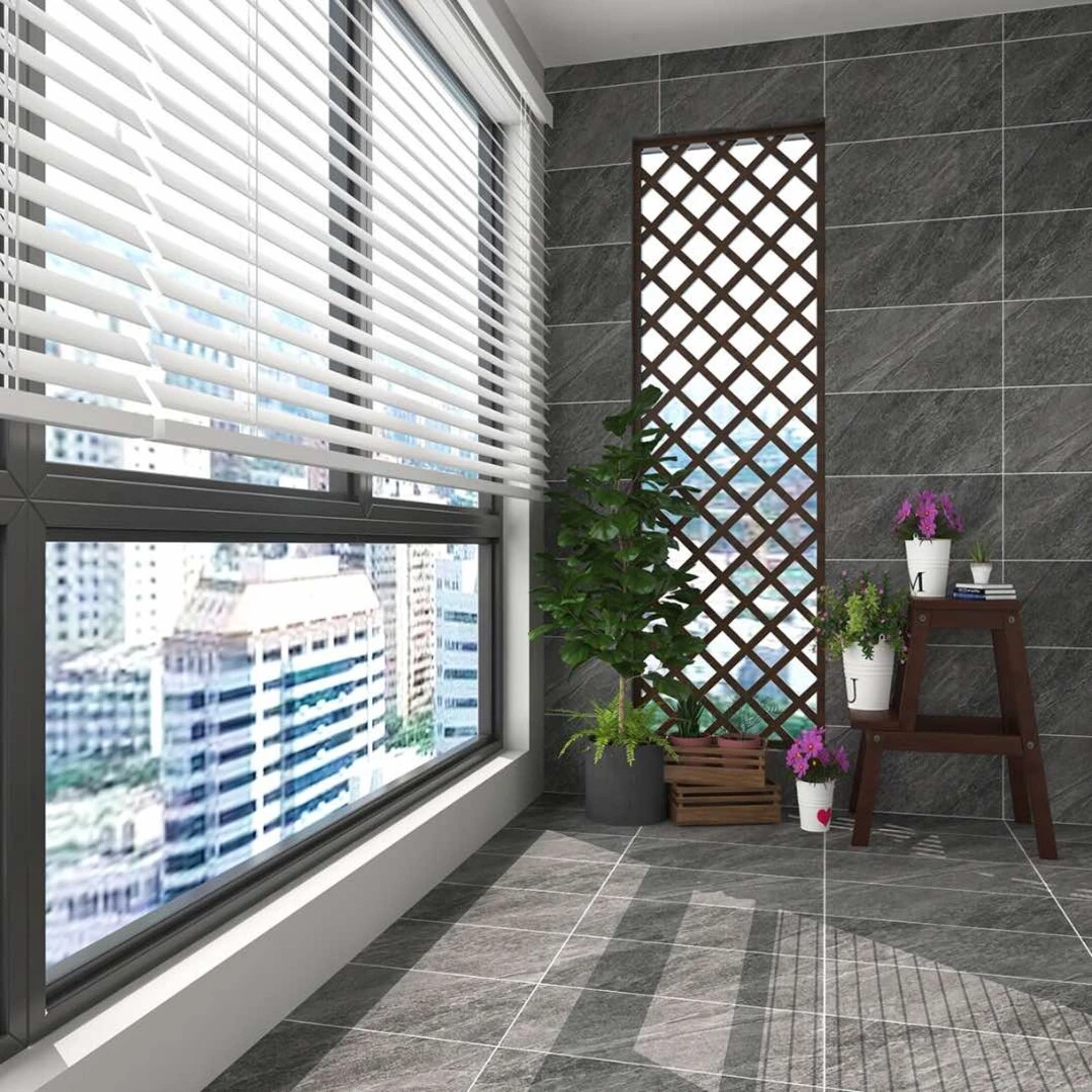 Gạch ốp tường màu đen giúp phòng khách thiết kế mở trở nên sang trọng